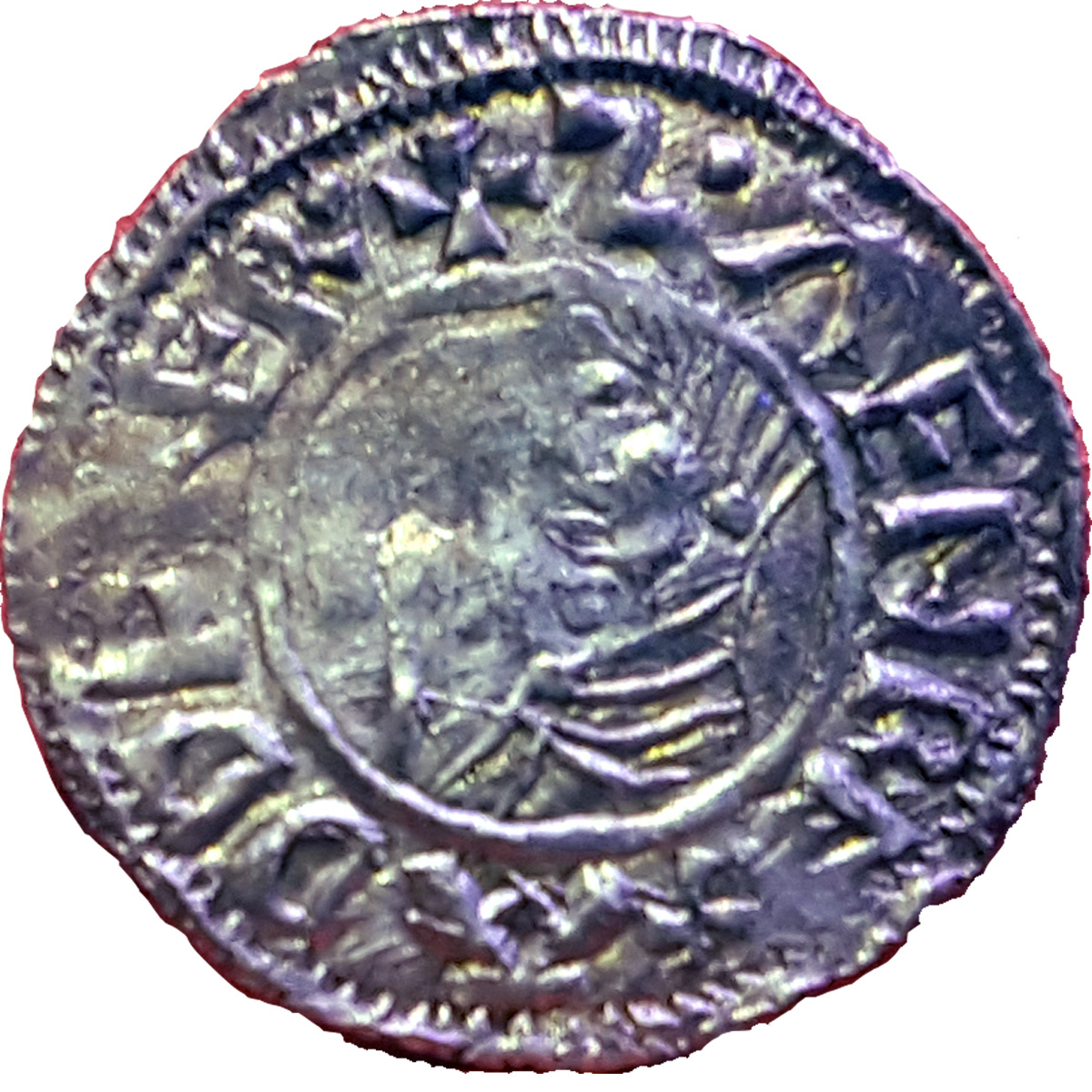 Ett av Svend Tveskægs mynt med inskrift präglat av den engelske myntaren Godwine